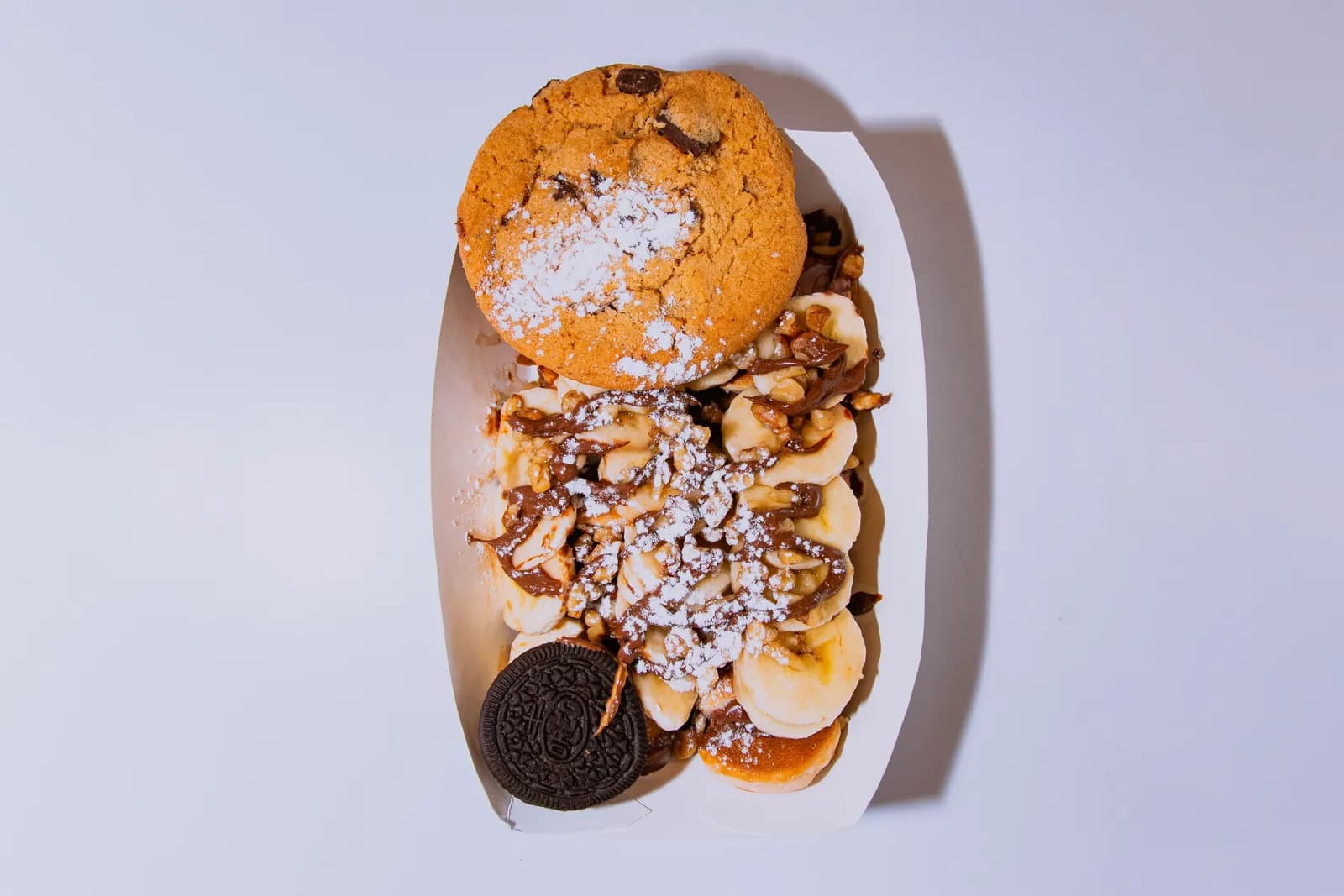 A dessert of cookies and sliced bananas